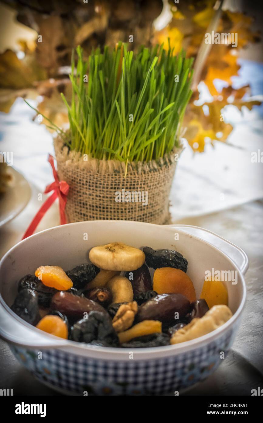Orthodox Christmas offerings including young green wheat and dried fruit on a table Stock Photo