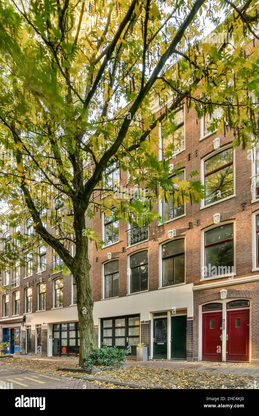 View to facade of a modern residential building Stock Photo - Alamy