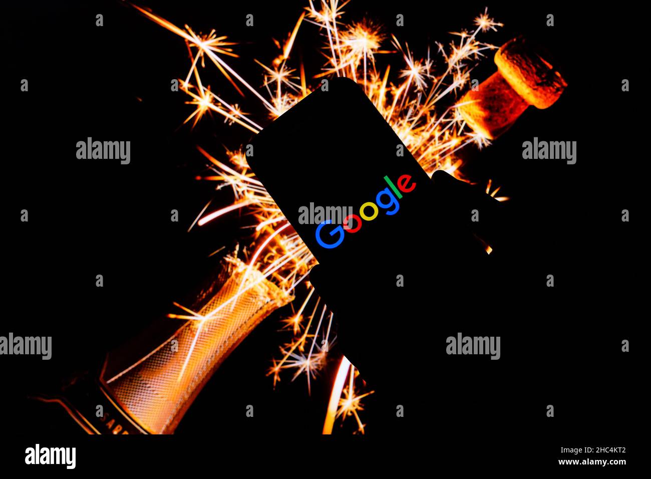 In this photo illustration a Google logo seen displayed on a smartphone. Stock Photo