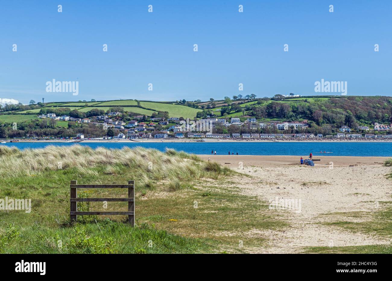 Looking from Llansteffan to Ferryside across the estuary of the River Towy (in welsh Tywi) in Carmarthenshire on a sunny June day. Stock Photo