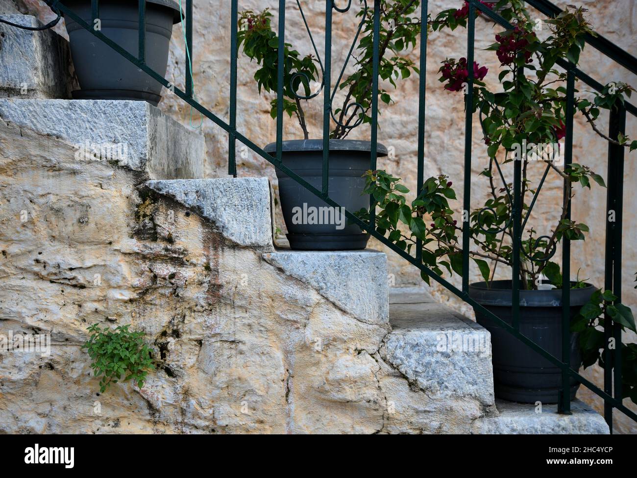 Greek Stone Railing Traditional handcrafted stone stairway with a wrought iron hand railing ...