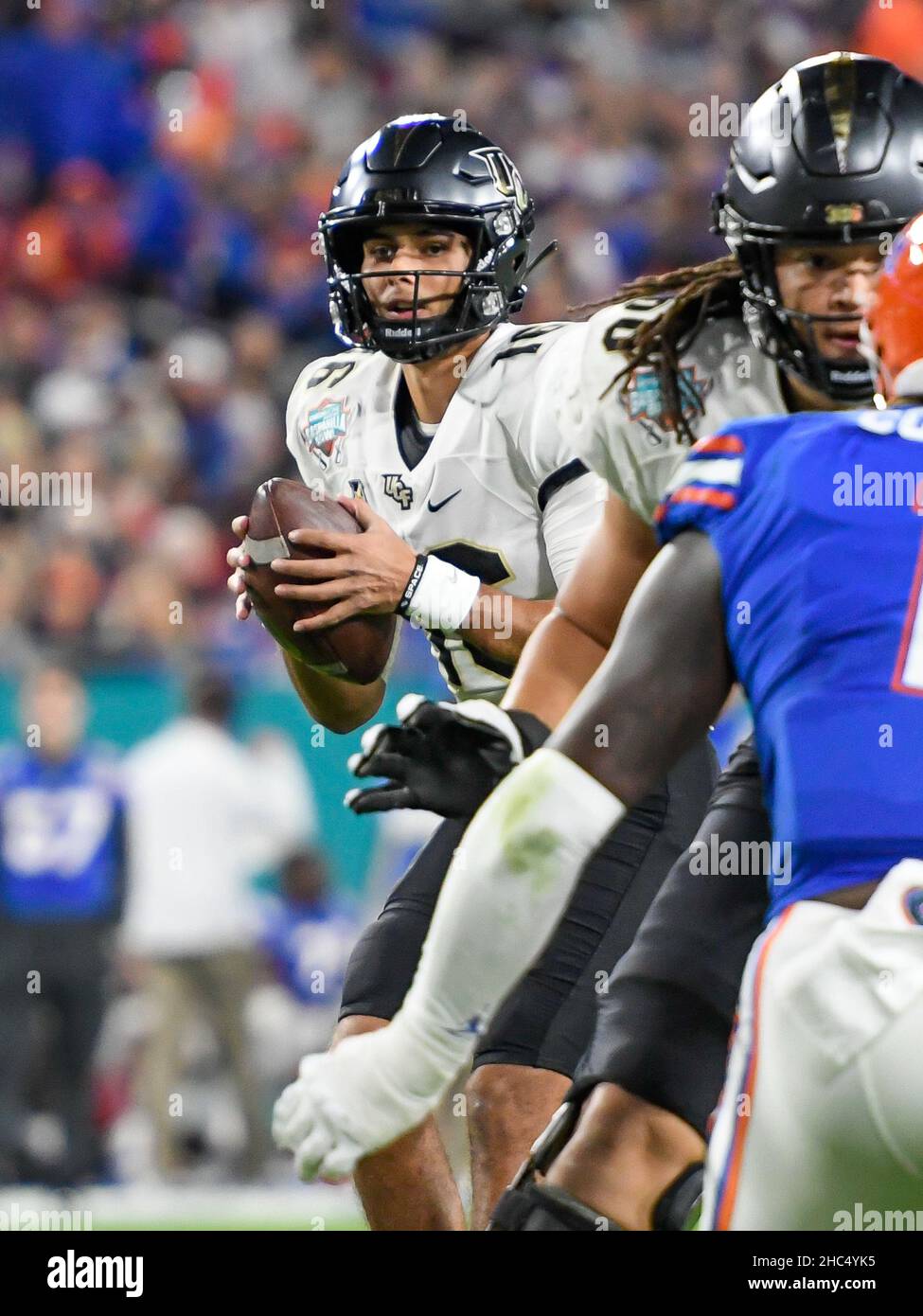 Tampa, FL, USA. 23rd Dec, 2021. UCF Knights quarterback Mikey Keene (16) during the 1st half of Union Home Mortgage Gasparilla Bowl between the Florida Gators and the UCF Knights at Raymond James Stadium in Tampa, FL. Romeo T Guzman/CSM/Alamy Live News Stock Photo