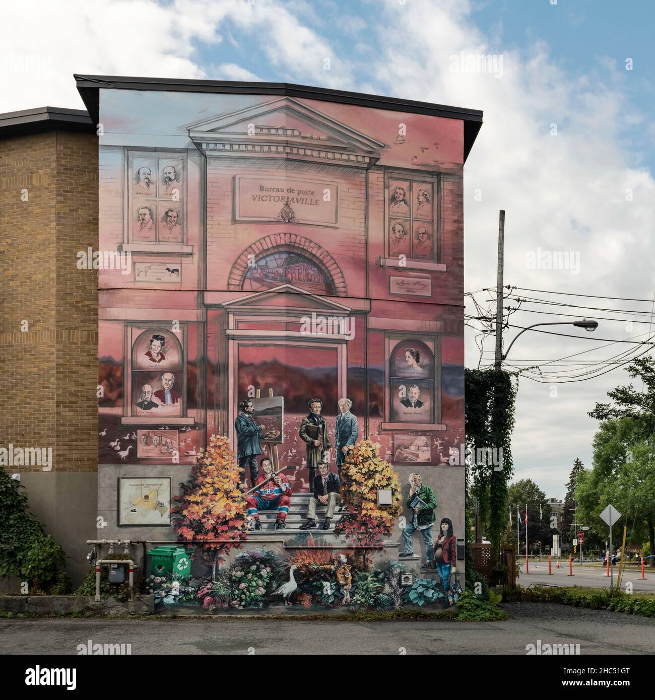 Victoriaville, Quebec, Canada - Sept 6, 2021: Mural for the 150 years of Victoriaville, illustration of its history and its dynamism. Located in the c Stock Photo