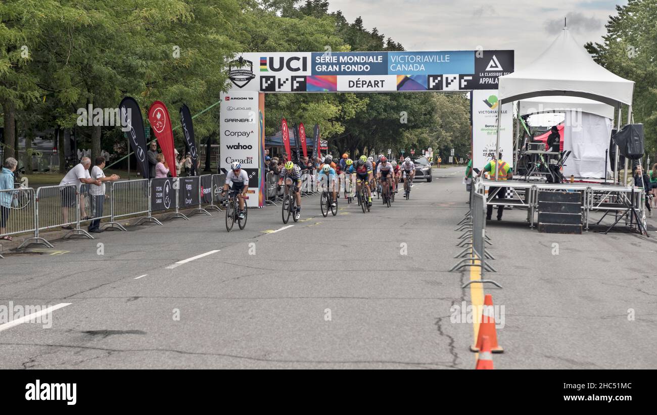 Victoriaville, Quebec, Canada - Sept. 6, 2021: City criterium , riders compete on bicycles in the streets in Victoriaville, Quebec, Canada. Stock Photo