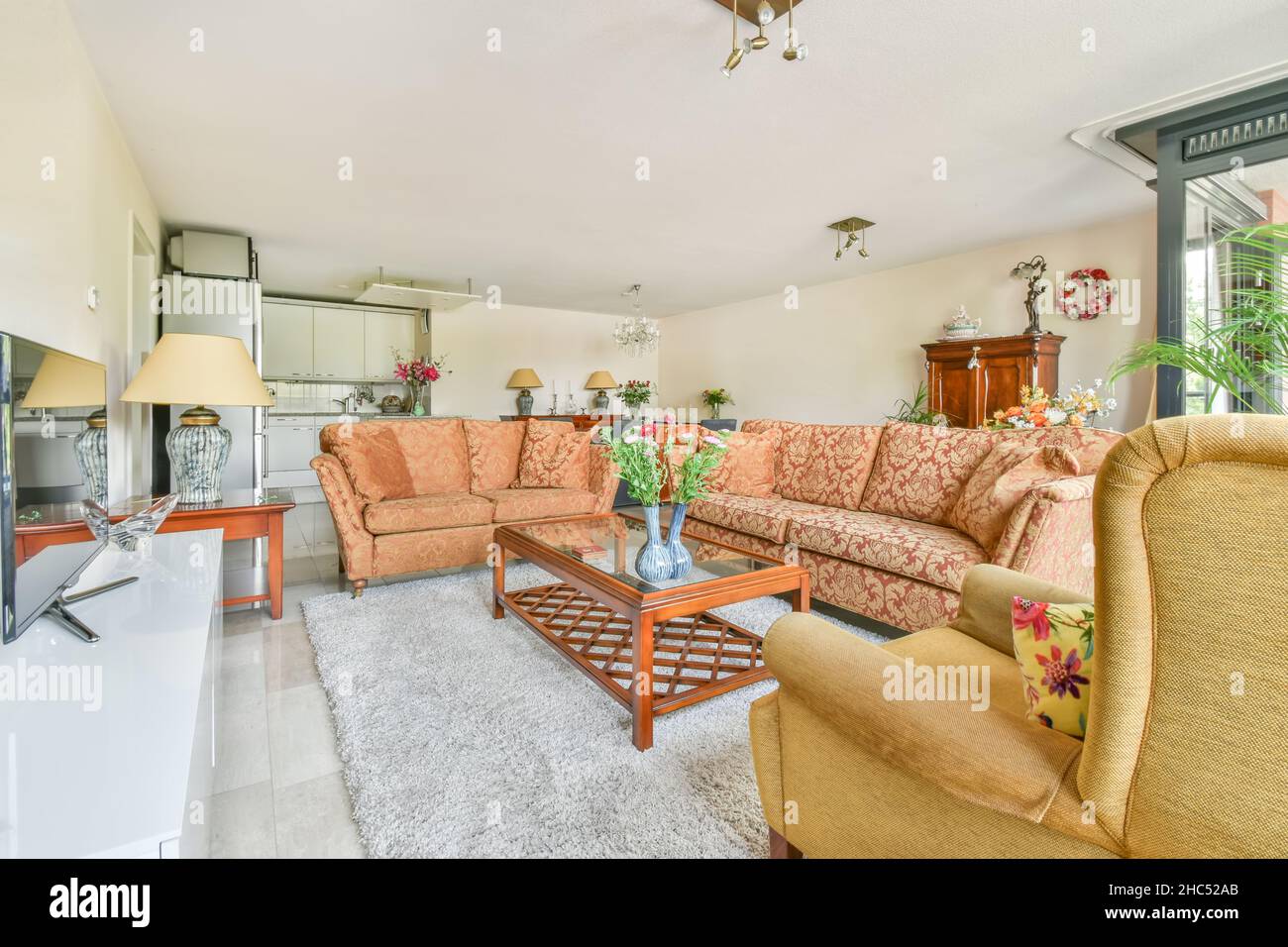 Stylish living room with vintage sofas and armchair Stock Photo Alamy
