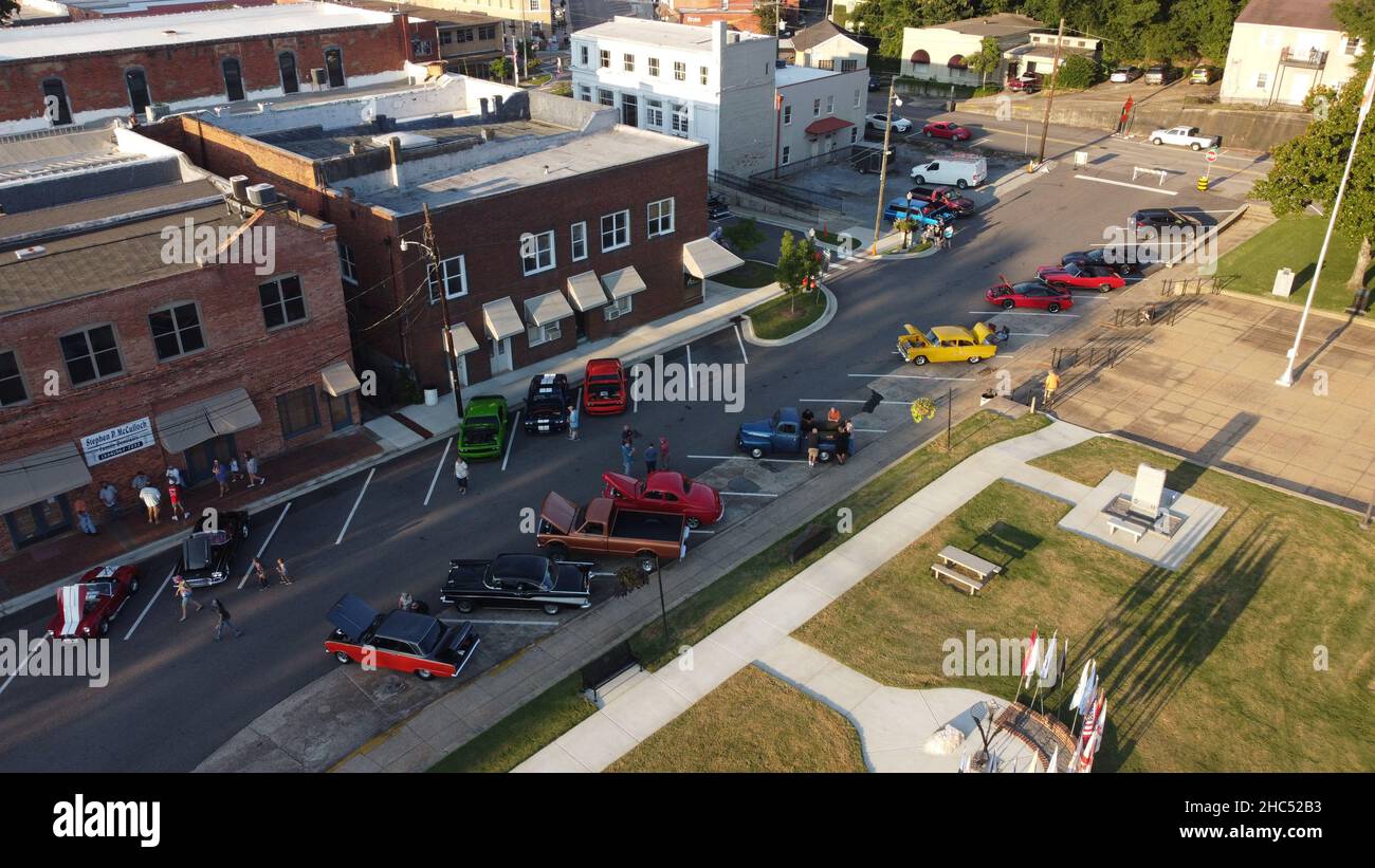 Aerial view of the buildings and the parking in front of it with luxury cars Stock Photo