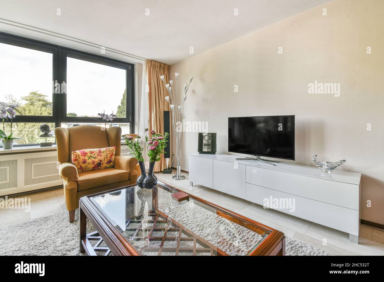 Stylish living room with vintage sofas and armchair Stock Photo Alamy