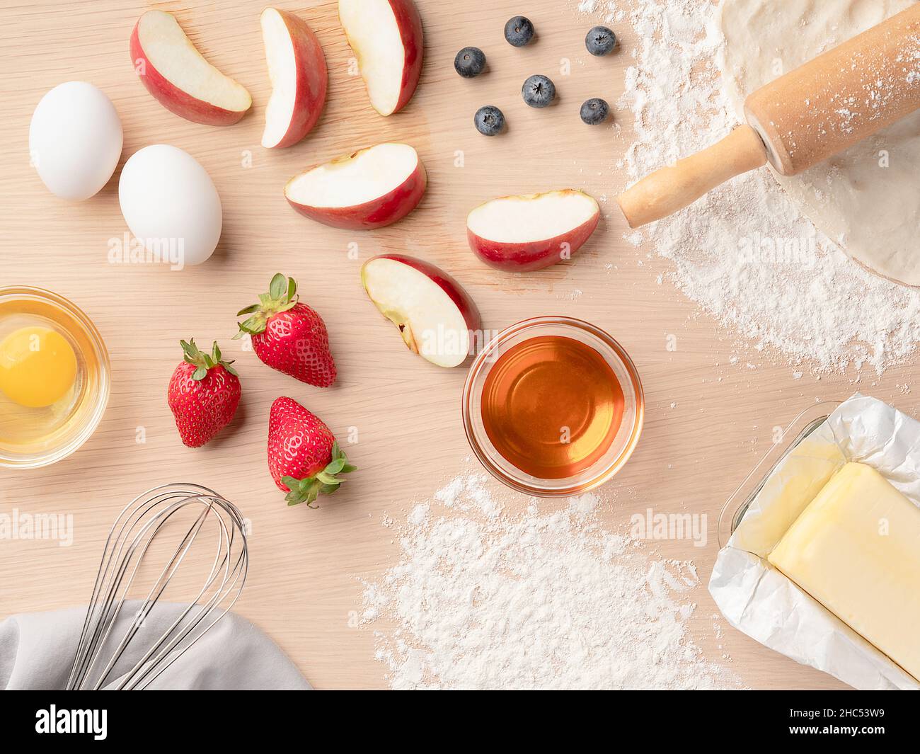 Top view of ingredients on a wooden table for baking a pie Stock Photo