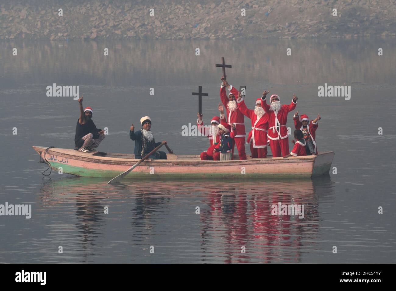 Lahore, Punjab, Pakistan. 24th Dec, 2021. Pakistani members of Bright