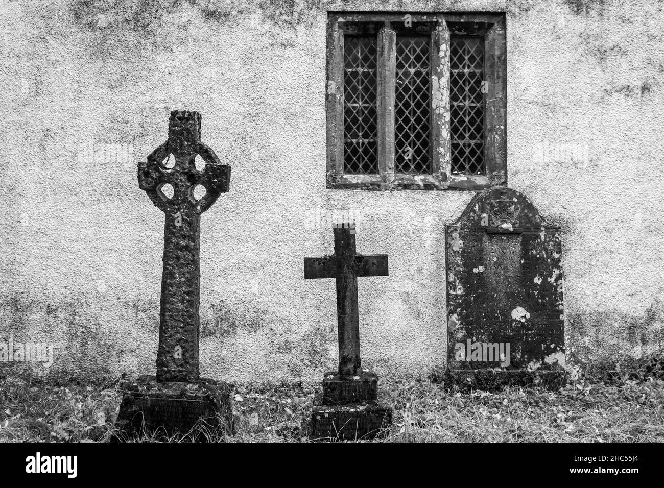 Gravestones within the graveyard of St John's church, Ulpha, Cumbria Stock Photo