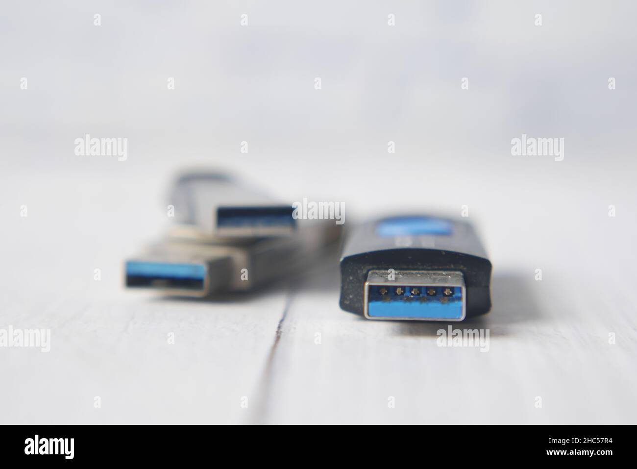 USB flash drive on pink background close up  Stock Photo