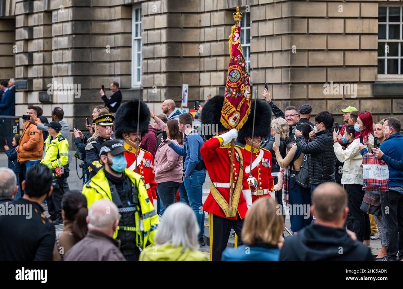 Royal Scots Dragoon Guards marching with flag standard at 50th anniversary parade, Royal Mile, Edinburgh, Scotland, UK Stock Photo