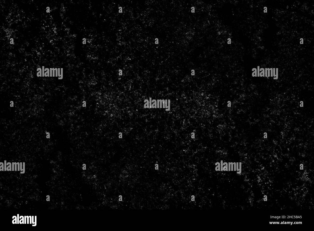 Scattered spread white dust particles on black background Stock Photo