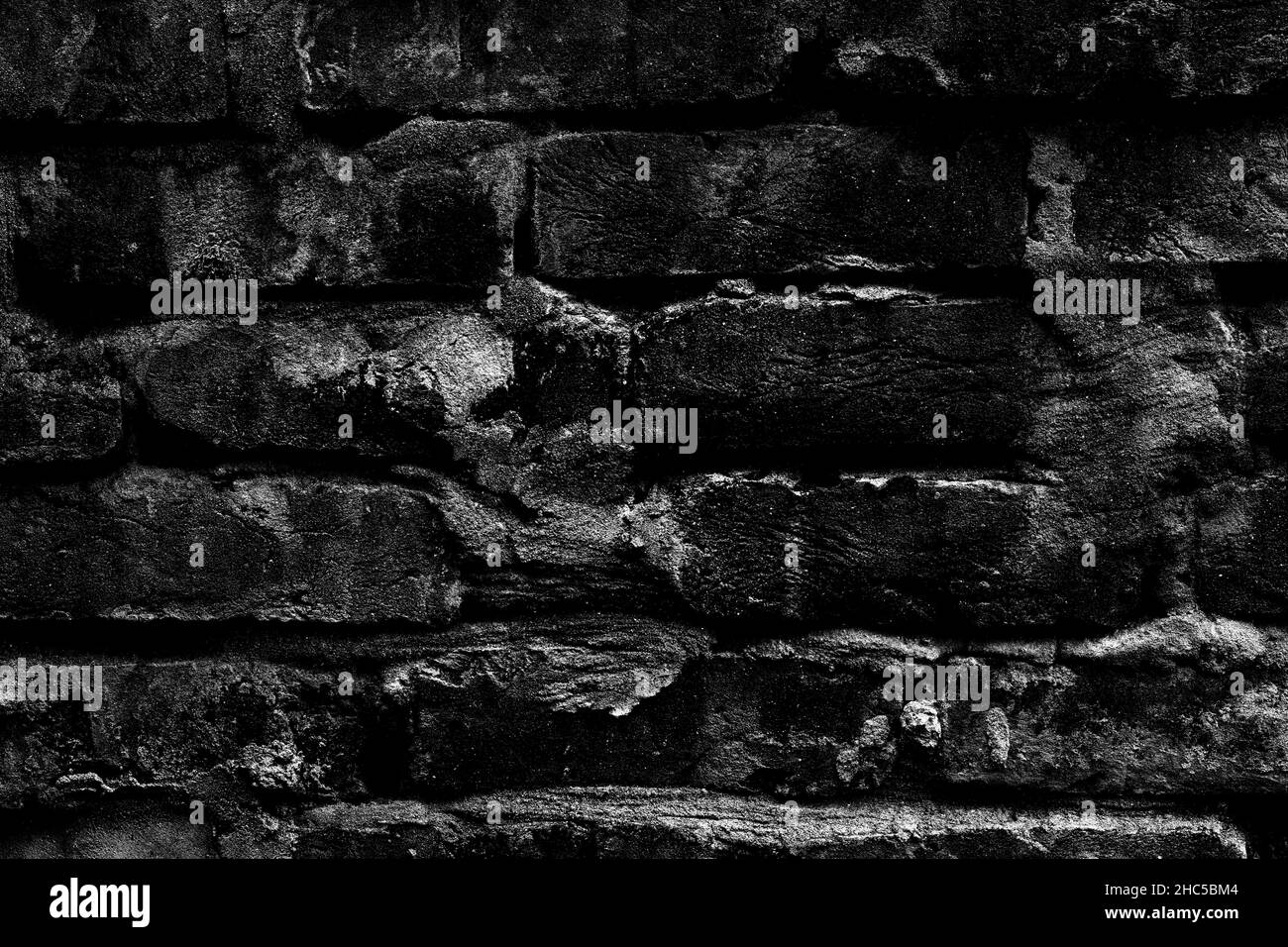 Dark moody rough brick wall for texture background Stock Photo - Alamy
