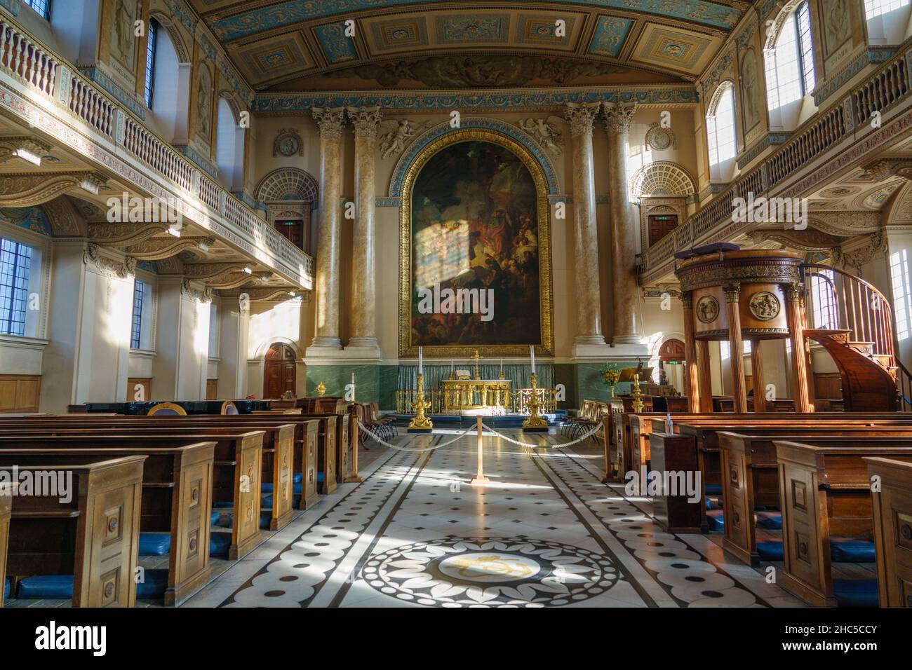 Interior of the church. Chapel of St Peter and St Paul, Old Royal Naval College, Greenwich, London. Altarpiece artwork by Benjamin West. Stock Photo