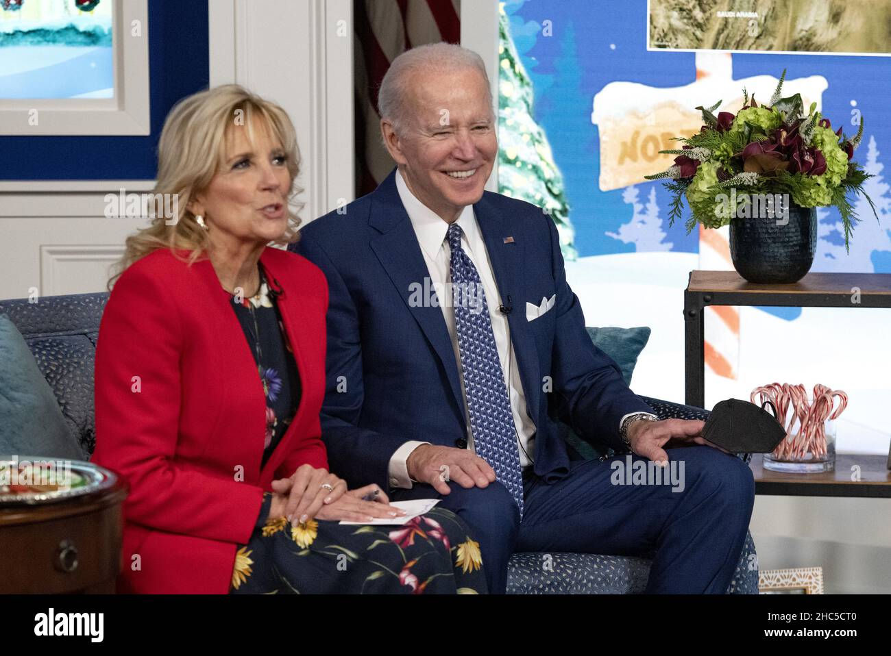 Washington, United States. 24th Dec, 2021. United States President Joe Biden and first lady Dr. Jill Biden speak to families from the South Court Auditorium, on the White House grounds in Washington, DC, as NORAD (North American Aerospace Defense Command) follows Santa's journey on Christmas Eve, Friday, December 24, 2021. Photo by Ron Sachs/UPI Credit: UPI/Alamy Live News Stock Photo