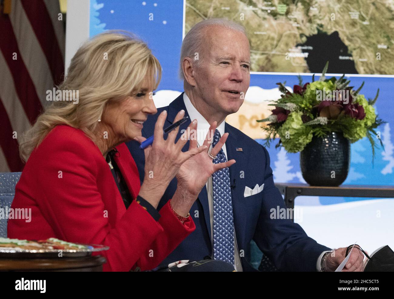 Washington, United States. 24th Dec, 2021. United States President Joe Biden and first lady Dr. Jill Biden speak to families from the South Court Auditorium, on the White House grounds in Washington, DC, as NORAD (North American Aerospace Defense Command) follows Santa's journey on Christmas Eve, Friday, December 24, 2021. Photo by Ron Sachs/UPI Credit: UPI/Alamy Live News Stock Photo