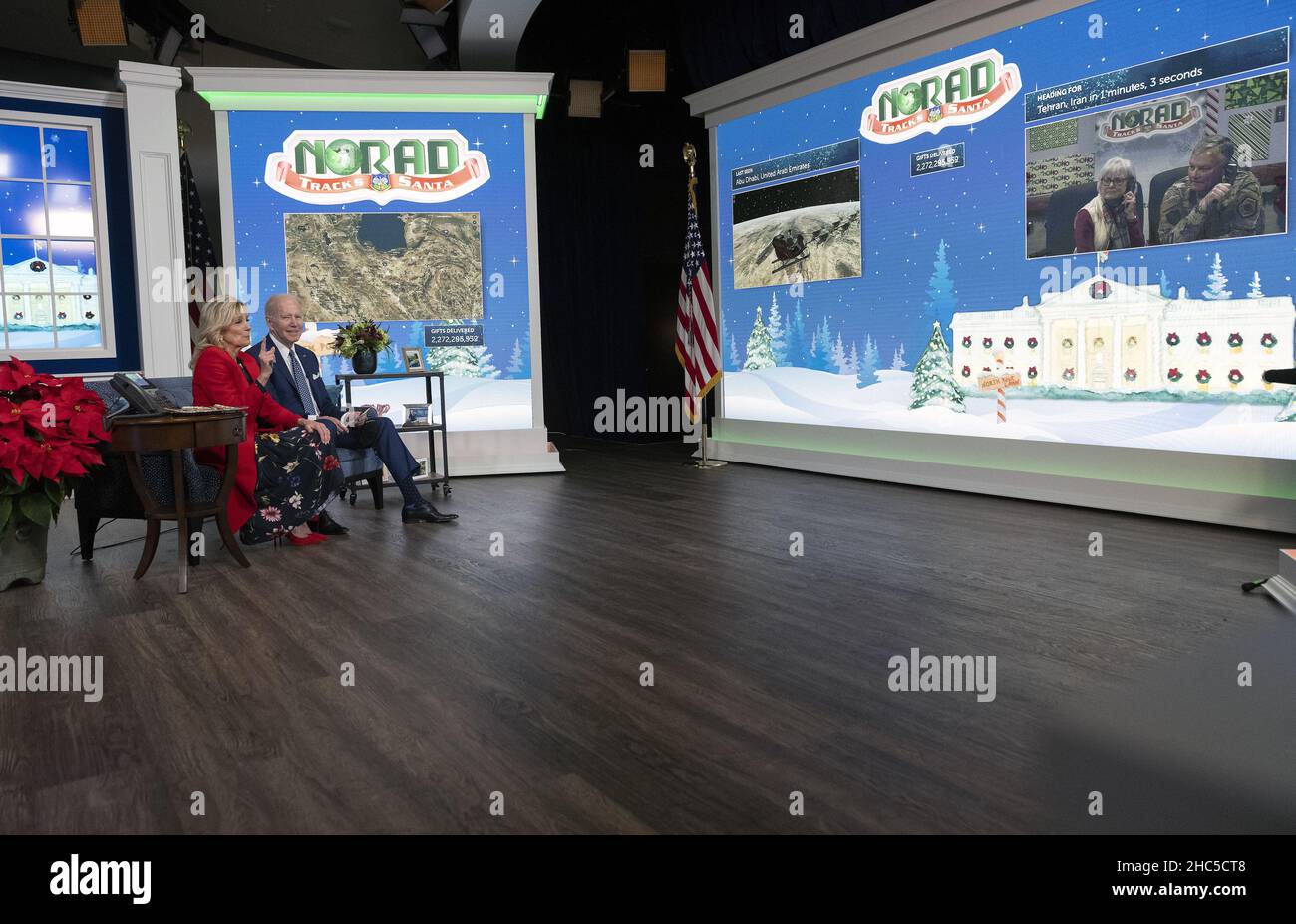 Washington, United States. 24th Dec, 2021. United States President Joe Biden and first lady Dr. Jill Biden speak to families from the South Court Auditorium, on the White House grounds in Washington, DC, as NORAD (North American Aerospace Defense Command) follows Santa's journey on Christmas Eve, Friday, December 24, 2021. Photo by Ron Sachs/UPI Credit: UPI/Alamy Live News Stock Photo