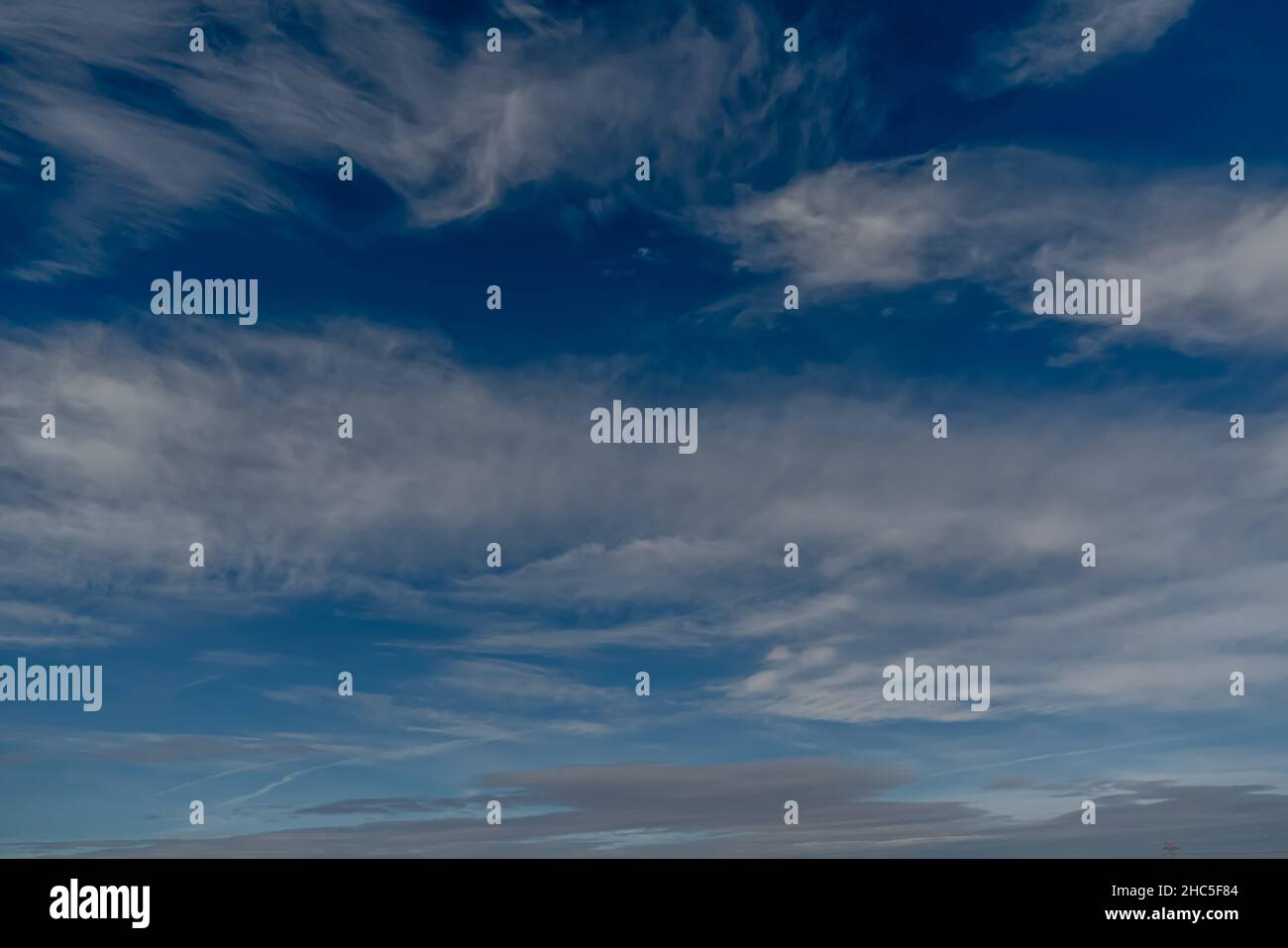 Blue sky with white clouds in a sunny day Stock Photo - Alamy
