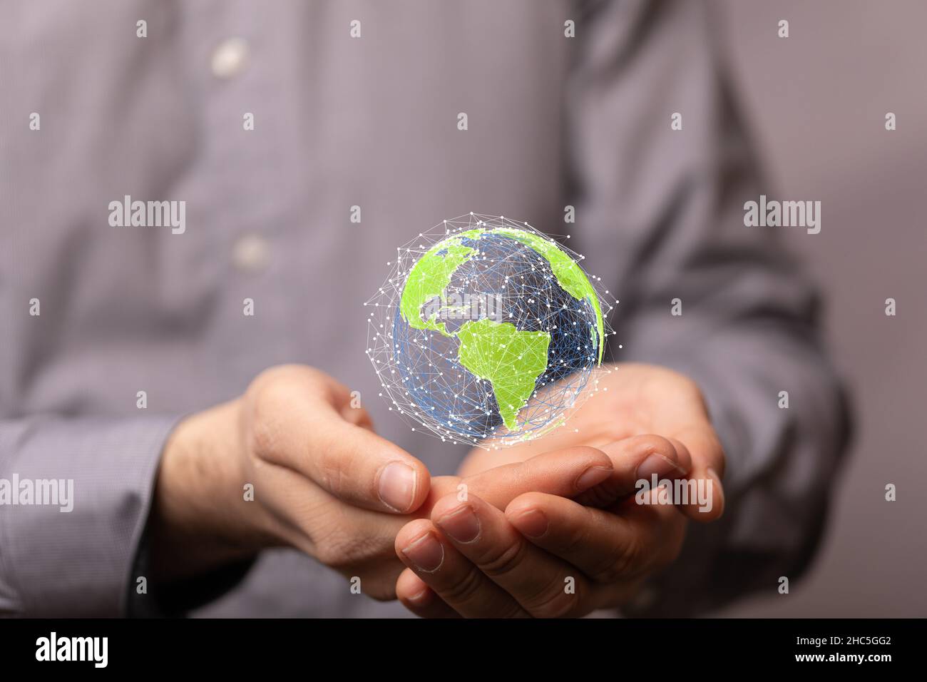 3D rendered globe network structure hovering over a humans hand Stock ...