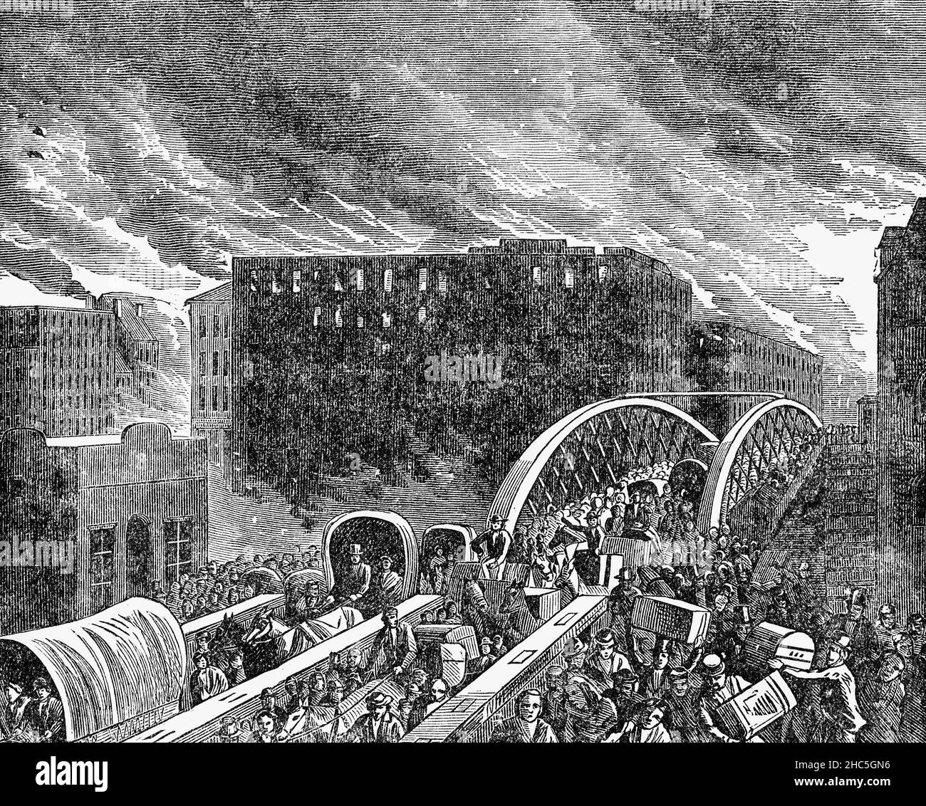 A late 19th Century illustration of the Great Chicago Fire, a conflagration that burned in the American city of Chicago during October 8–10, 1871. The fire killed approximately 300 people, destroyed roughly 3.3 square miles of the city including over 17,000 structures, and left more than 100,000 residents homeless. The fire began in a neighbourhood southwest of the city center after a long period of hot dry windy conditions and the wooden construction prevalent in the city, led to the conflagration. Stock Photo
