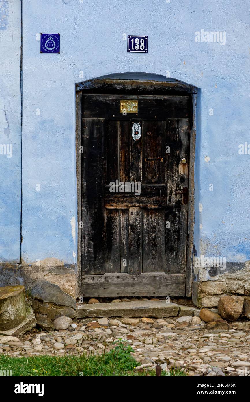 An old door in building of the Village of Viscri in Romania Stock Photo