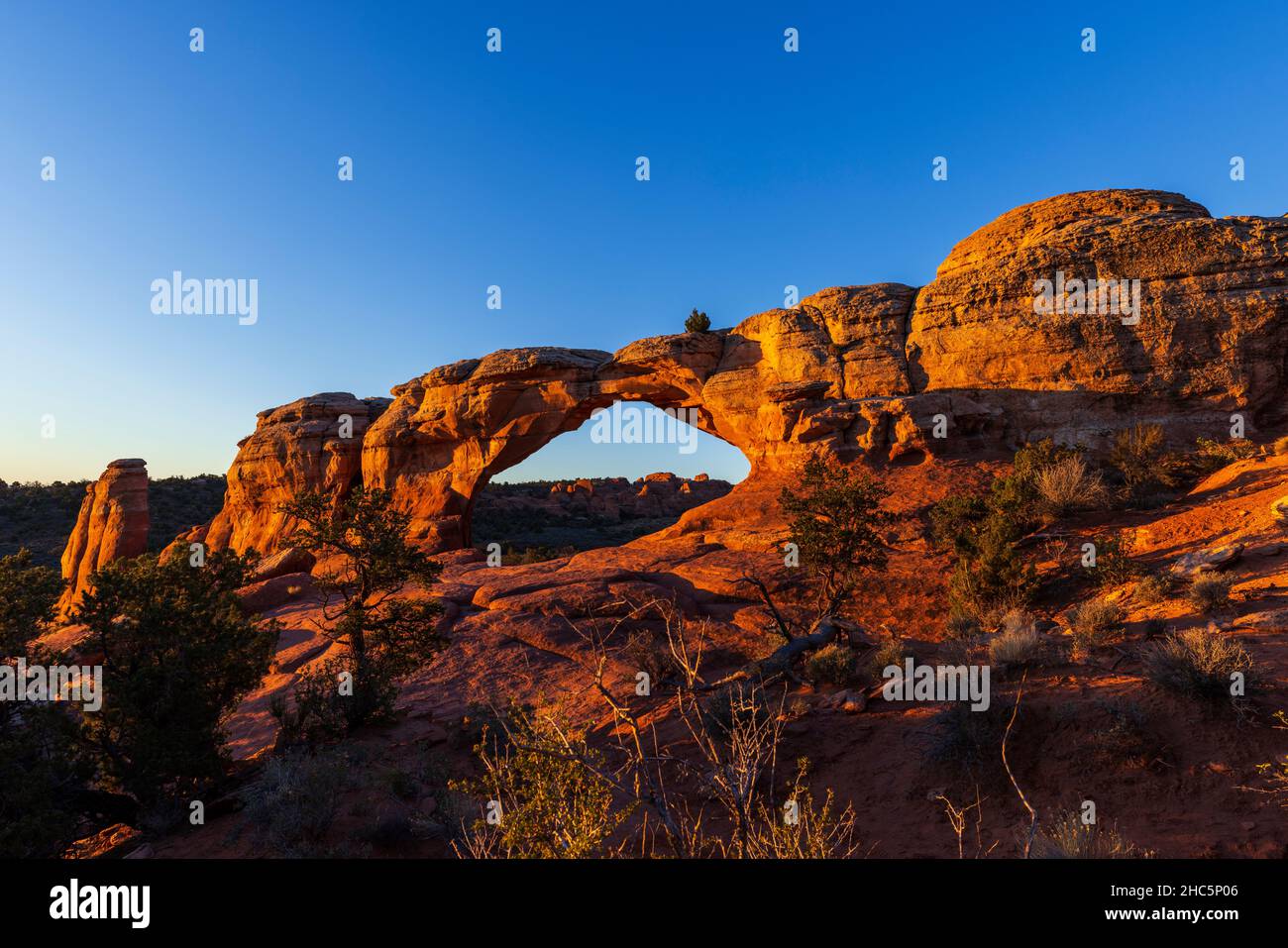 Broken Arch at sunrise in Arches National Park, Utah Stock Photo