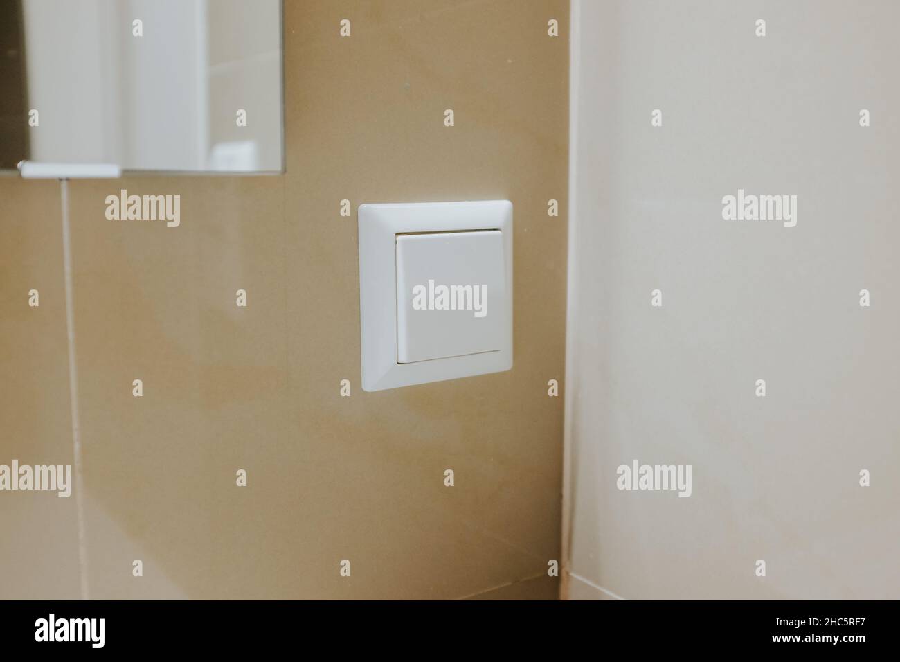 Closeup of a white plastic light switch in the bathroom Stock Photo Alamy