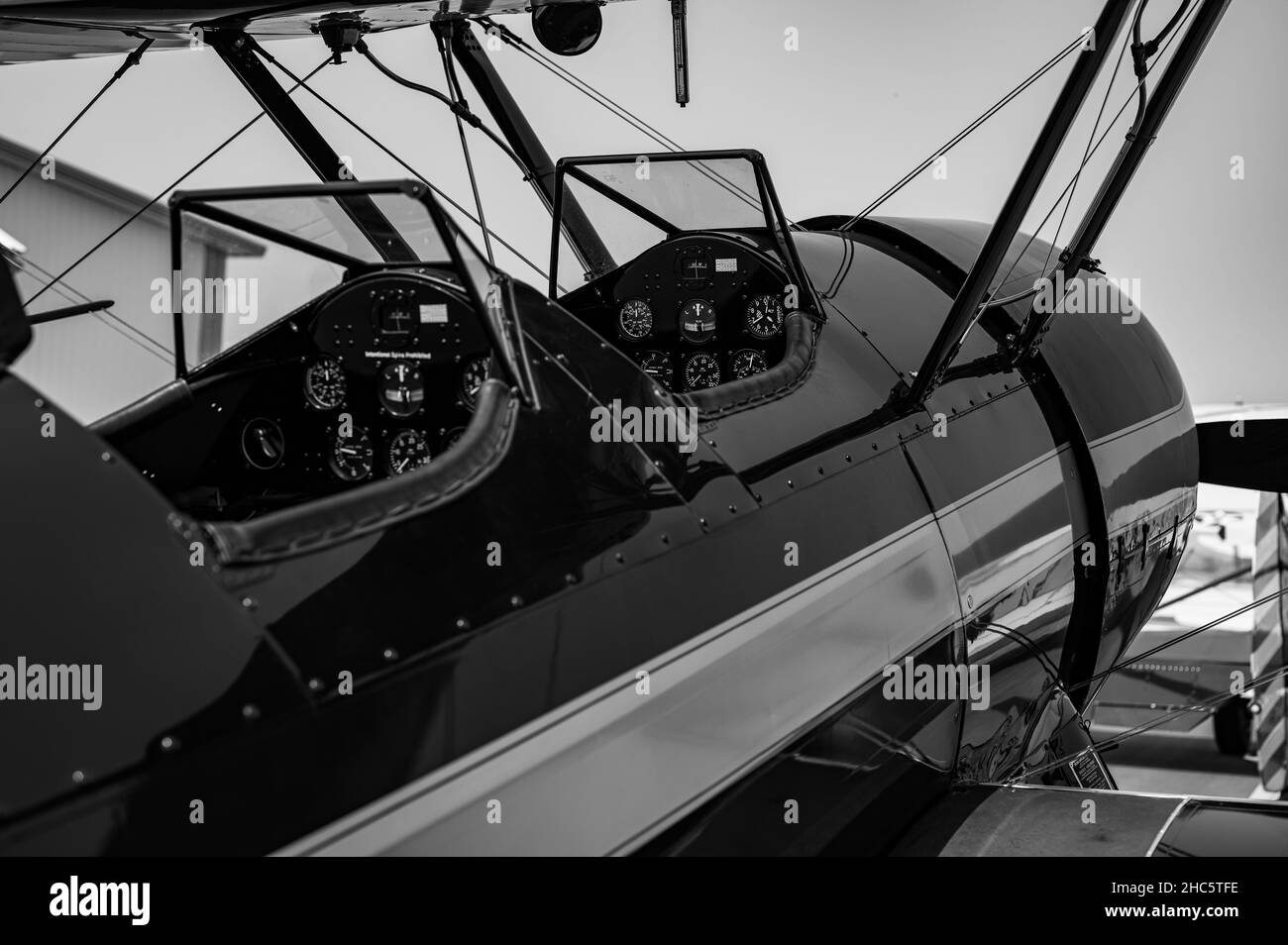 Grayscale image of a modern biplane with a beautiful modern design Stock Photo