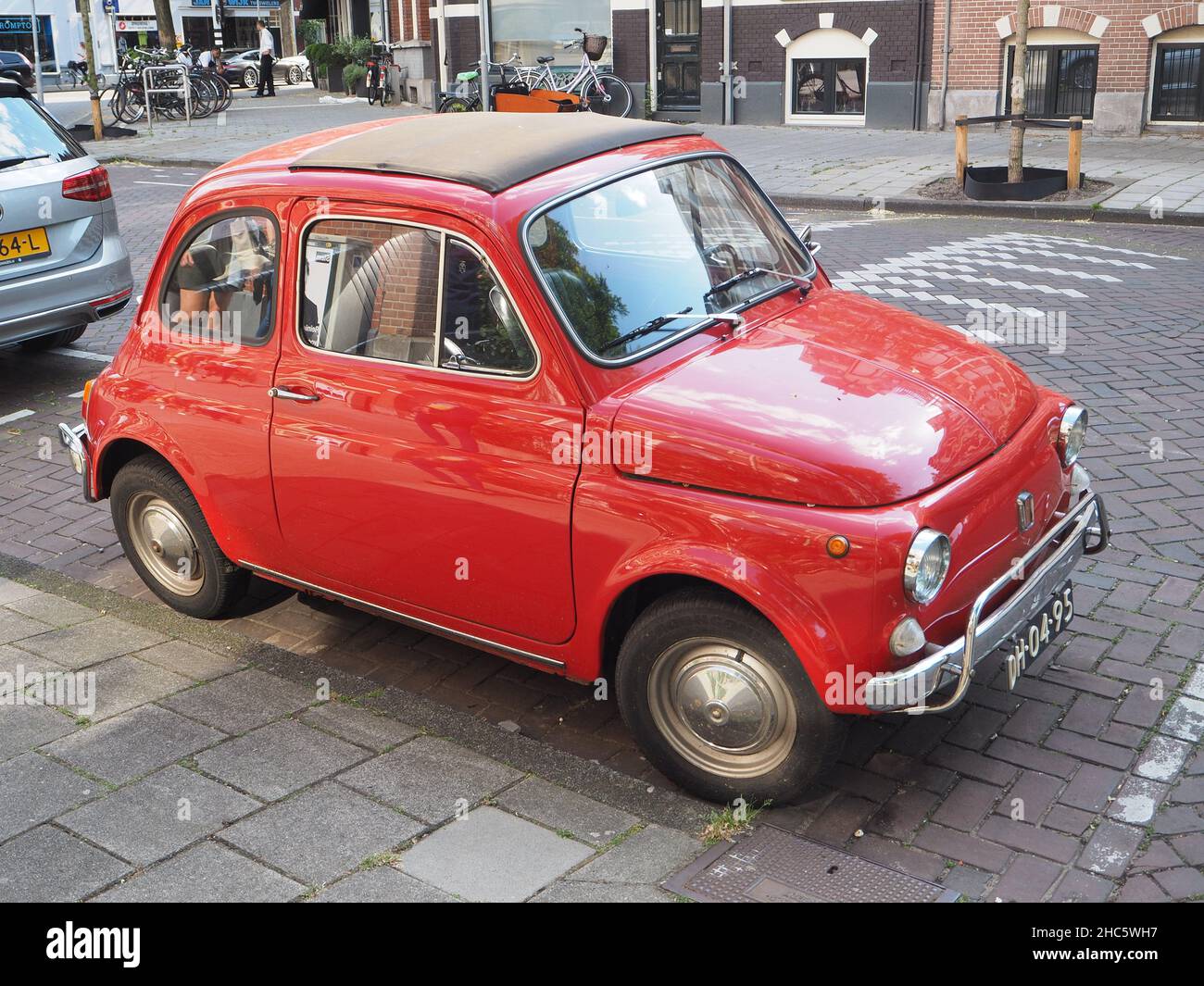 Retro red car parked in the streets of Amsterdam Stock Photo Alamy