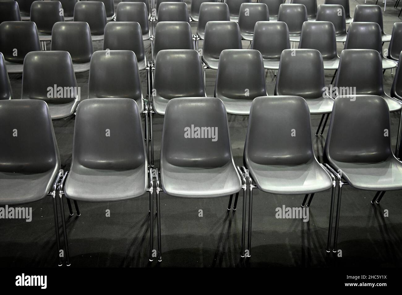 Gray empty audience seats arranged in rows Stock Photo Alamy