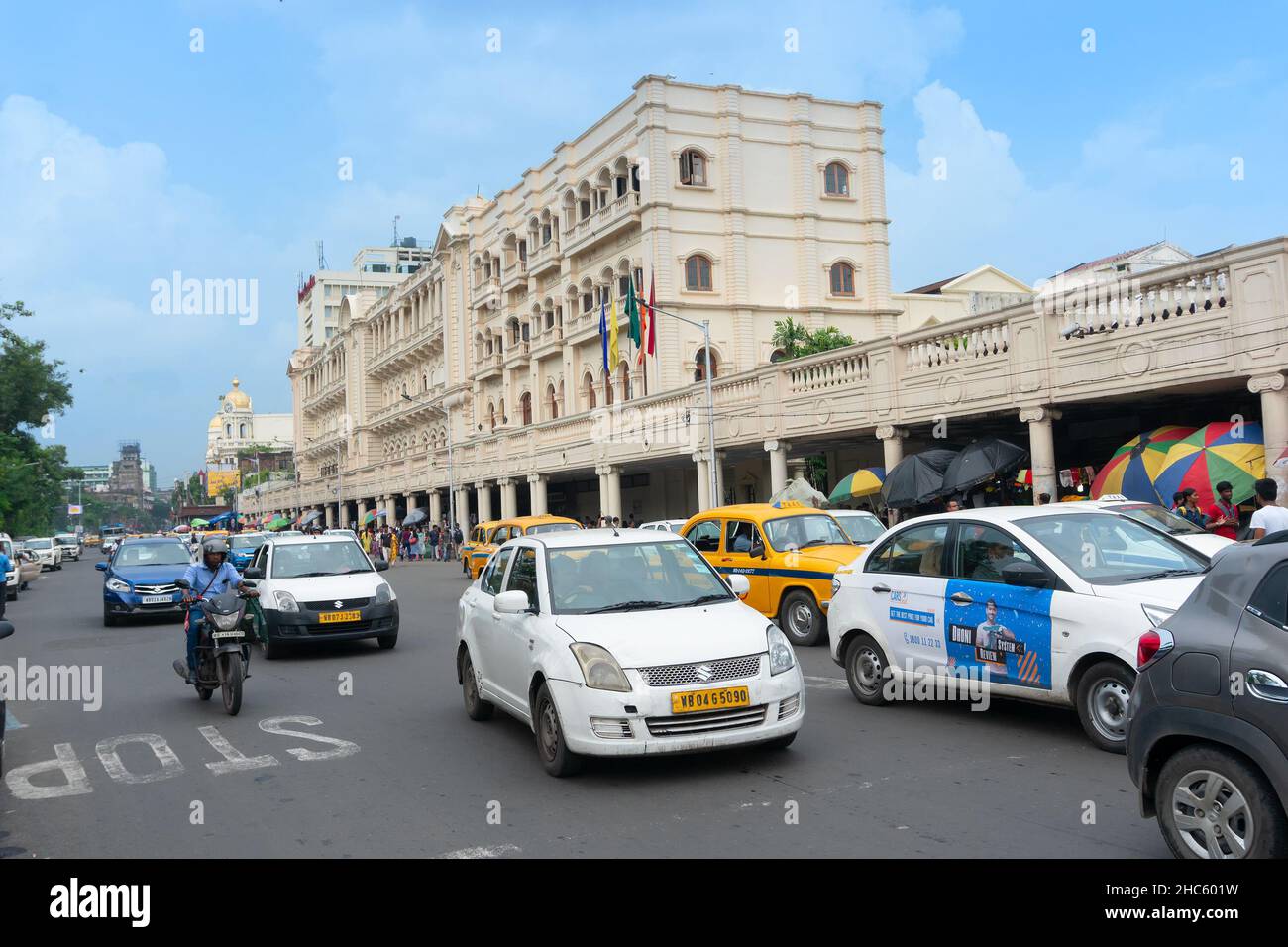 Kolkata, West Bengal, India - 10th September 2019 : Grand Hotel, iconic historic building of Kolkata at busy traffic Esplanade area. Moving cars. Stock Photo