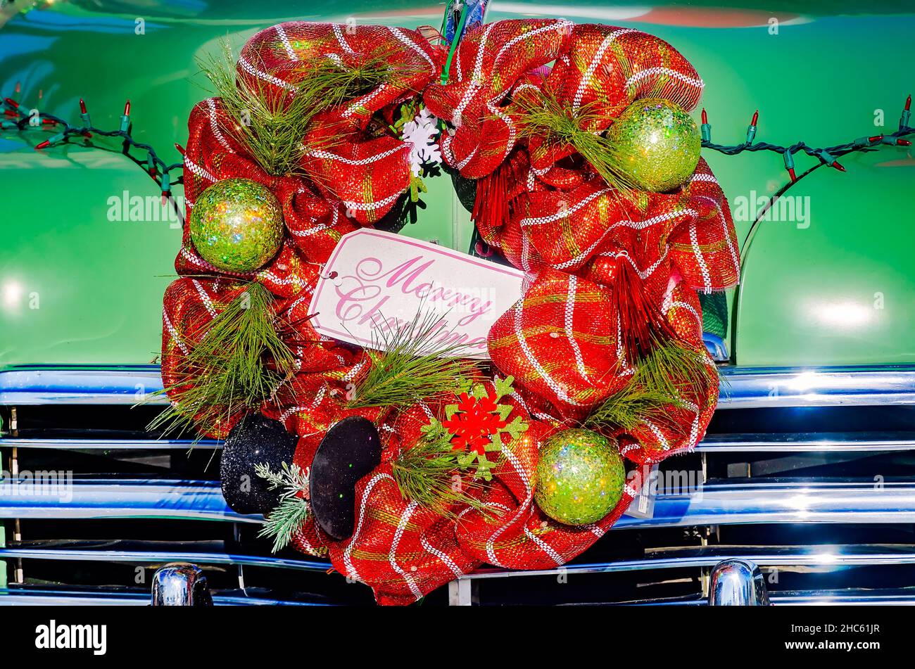 A Christmas wreath hangs on the grille of a restored 1949 Plymouth Special De Luxe automobile, Dec. 24, 2021, in Dauphin Island, Alabama. (Photo by Ca Stock Photo