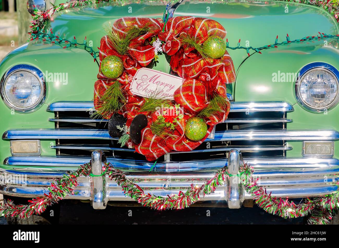 A Christmas wreath hangs on the grille of a restored 1949 Plymouth Special De Luxe automobile, Dec. 24, 2021, in Dauphin Island, Alabama. (Photo by Ca Stock Photo