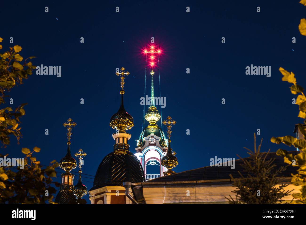Dome of the church with the cross with night sky on the background in Tambov, Russia Stock Photo