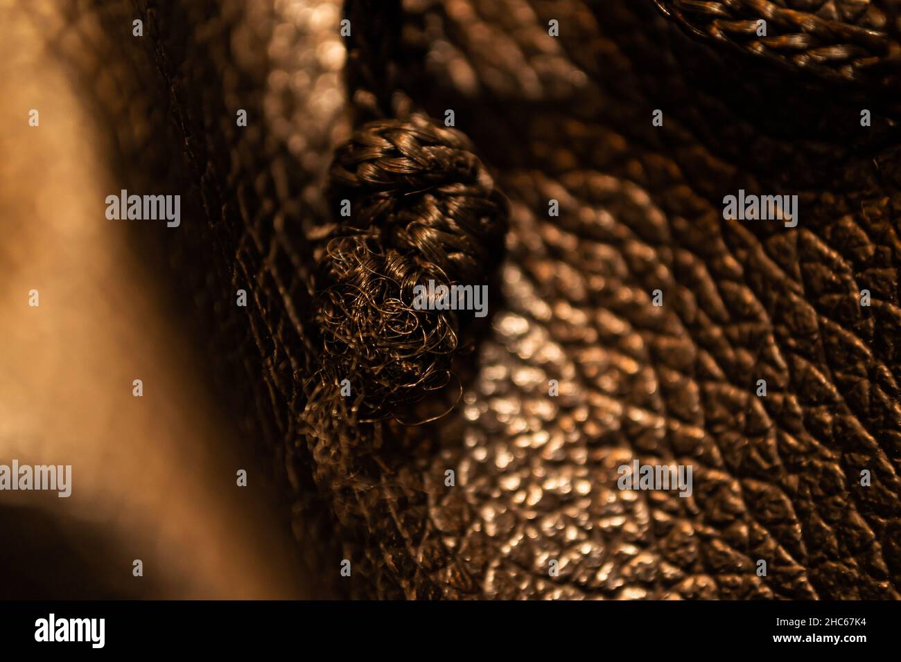 Texture of dark brown leather material Stock Photo