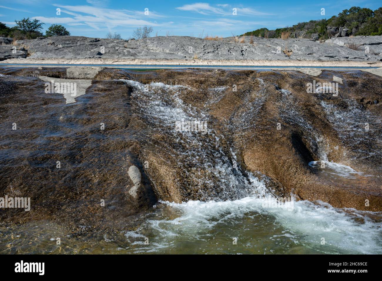 Johnson City, Texas, USA. 24 December, 2021. Waterfall. Warm weather at