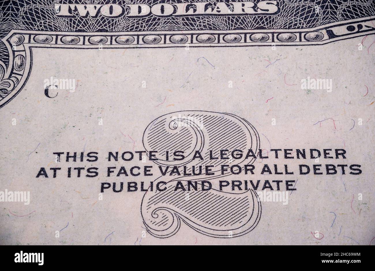 Closeup shot of a 2 Dollar Sign on the 2 Dollars US Note Stock Photo