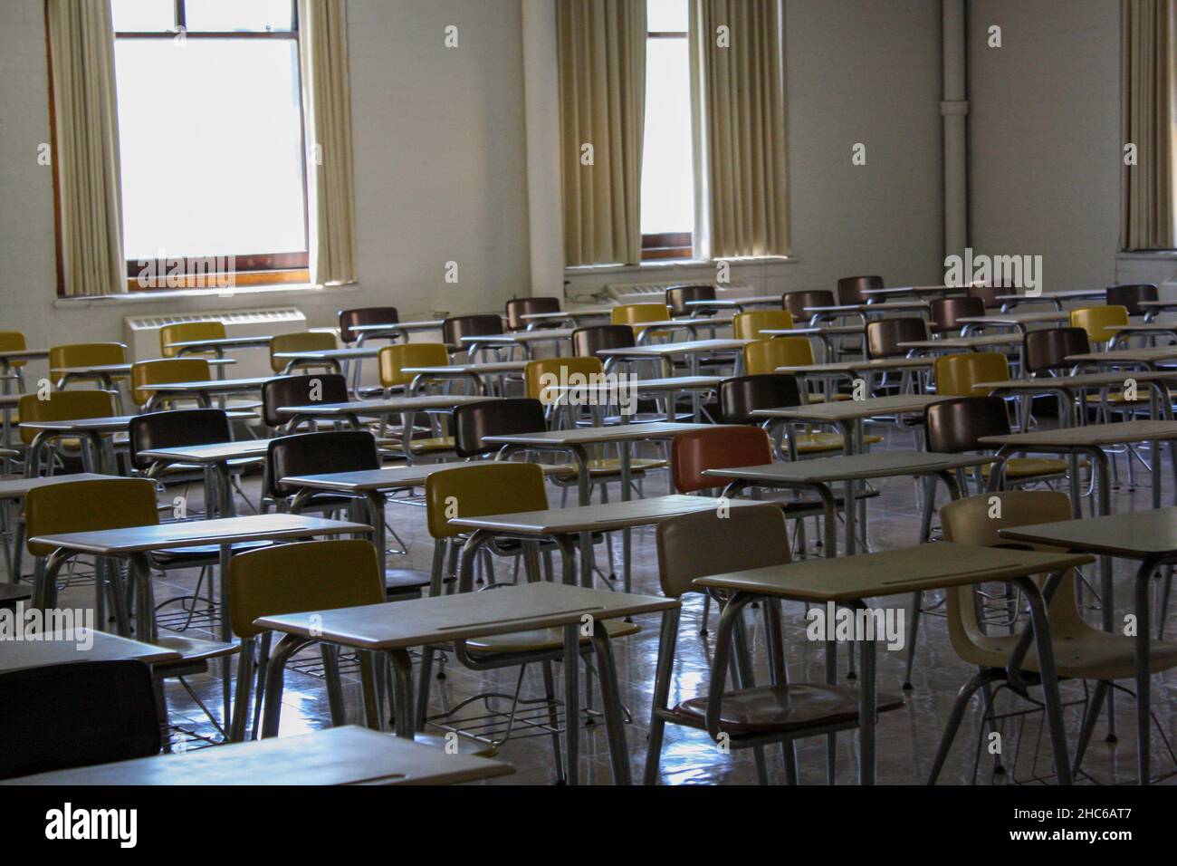 Empty desks in an empty classroom Stock Photo Alamy