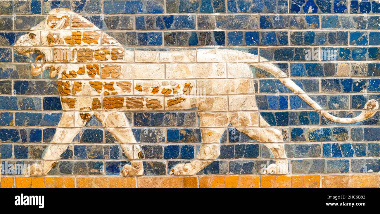 Lion relief on glazed bricks from the Ishtar Gate. Details of the Babylonian Ischtar Tor. Stock Photo