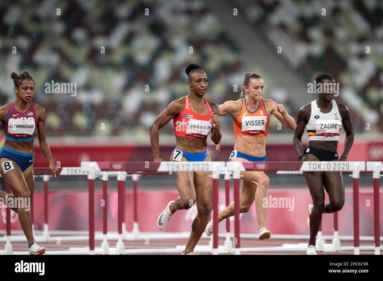 Jasmine CamachoQuinn running and winning in the final of the 100 meter hurdles at the 2020