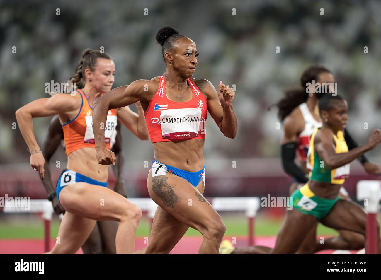 Jasmine CamachoQuinn running and winning in the final of the 100 meter hurdles at the 2020