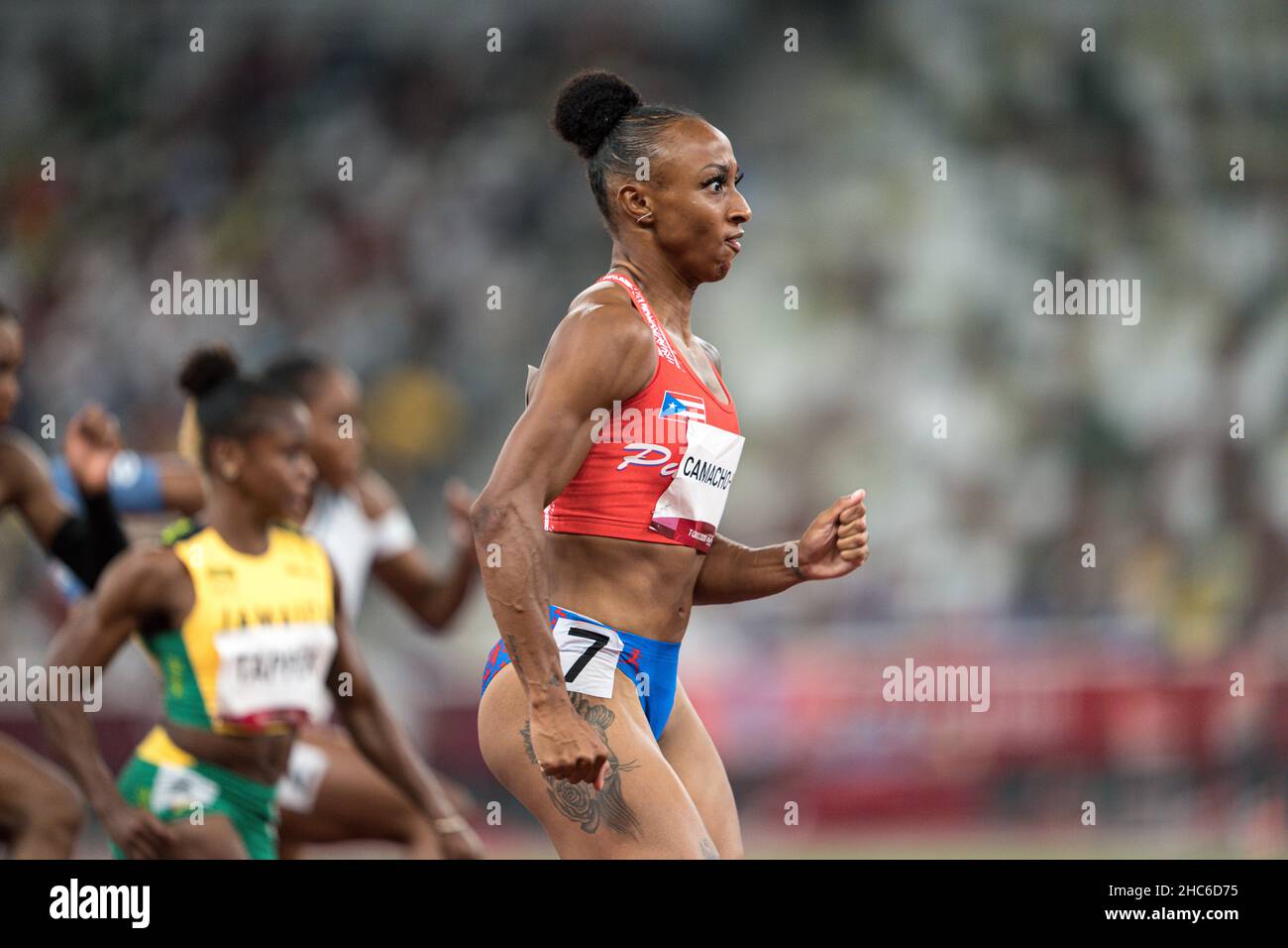 Jasmine CamachoQuinn running and winning in the final of the 100 meter hurdles at the 2020