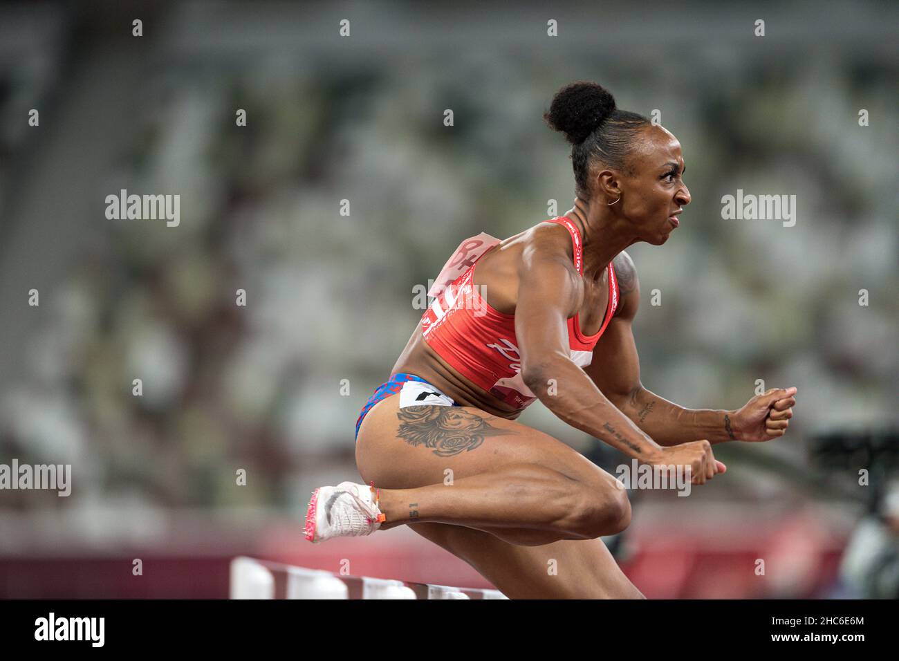 Jasmine CamachoQuinn running and winning in the final of the 100 meter hurdles at the 2020