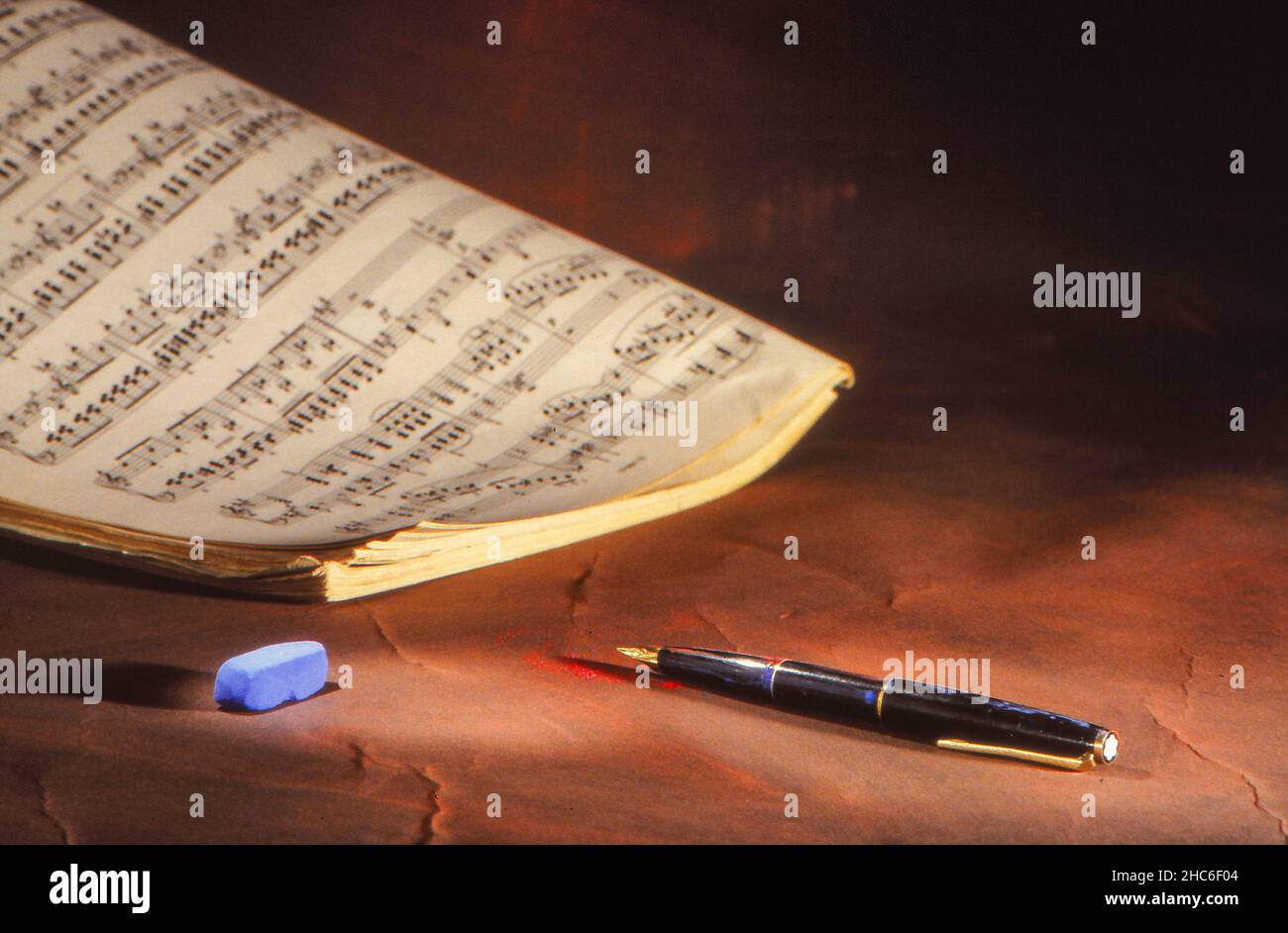 Sheet music, notes, fountain pen and chalk Stock Photo