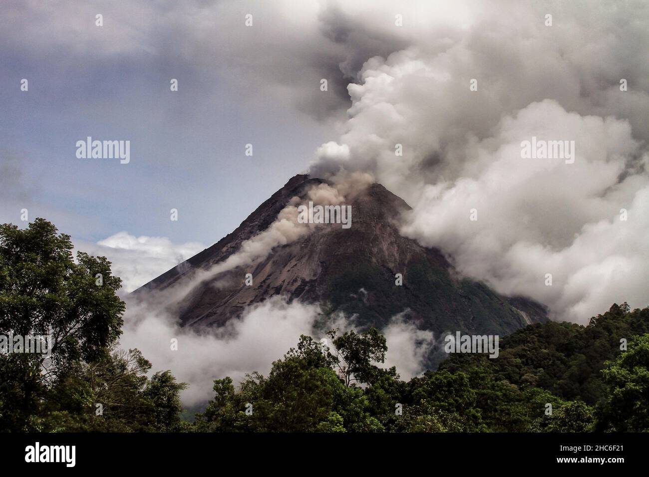 Mount Merapi, Indonesias most active volcano spews ash and smoke from ...