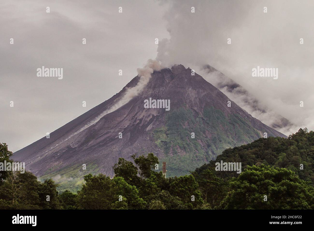 Mount Merapi, Indonesias most active volcano spews ash and smoke from ...