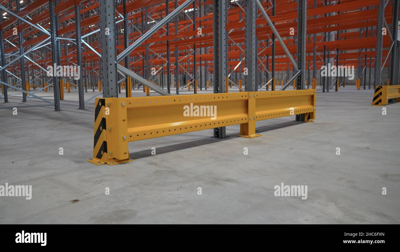 Column protection in warehouse Stock Photo