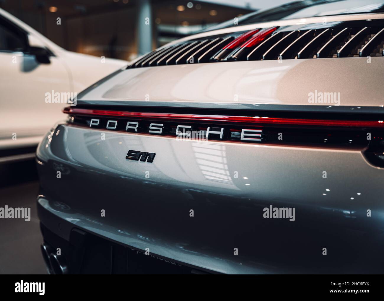 Expensive supercar displayed in the showroom of a car dealership Stock