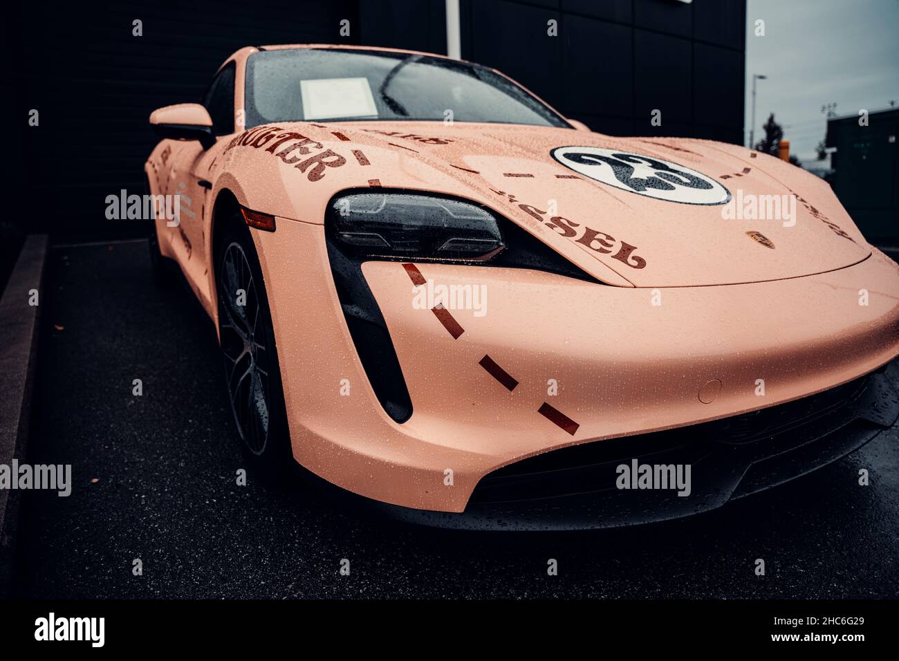 Expensive supercar displayed in the showroom of a car dealership Stock